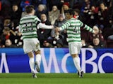 Celtic's Reo Hatate celebrates scoring their first goal with Matt O'Riley on January 26, 2022