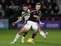 Hearts' Barrie McKay in action with Celtic's Cameron Carter-Vickers on January 26, 2022