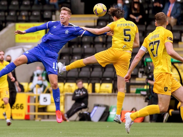 Rangers' Cedric Itten in action with Livingston's Jack Fitzwater, August 16, 2020