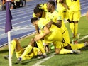 Jamaica's Daniel Johnson celebrates scoring their first goal with teammates on January 27, 2022