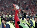 Jamie Carragher lifts the Champions League trophy in 2005