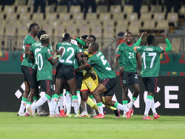 Malawi's Hellings Mhango celebrates scoring their first goal with teammates on January 25, 2022