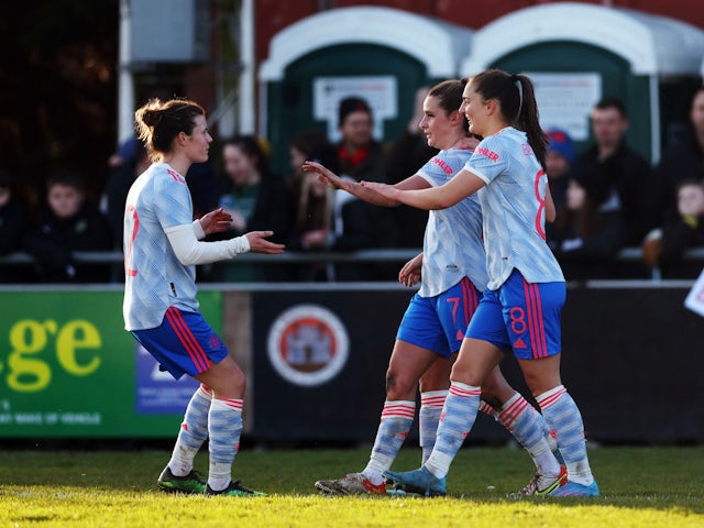 Manchester United Women's Ella Toone celebrates scoring their second goal with teammates on January 30, 2022
