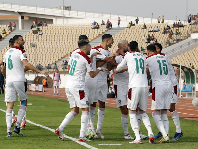 Morocco's Sofiane Boufal celebrates scoring their first goal with teammates on January 30, 2022