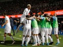 Uruguay's Luis Suarez celebrates scoring their first goal with teammates on January 27, 2022