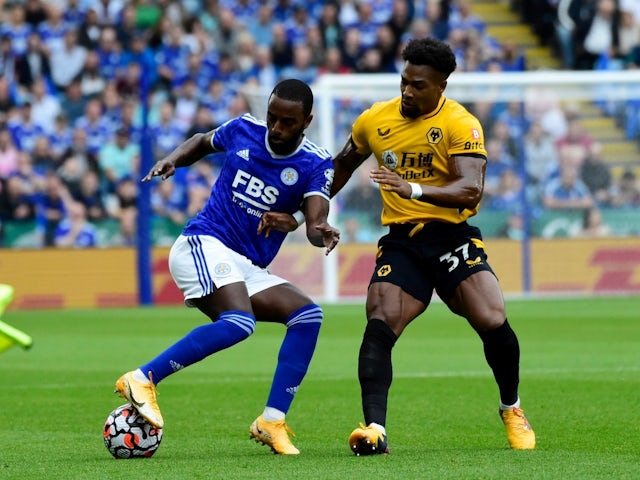 Leicester City's Ricardo Pereira in action with Wolverhampton Wanderers' Adama Traore, August 14, 2021