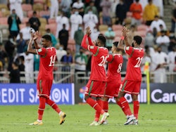 Oman players applaud fans after the match on January 27, 2022