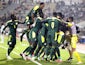 Senegal's Famara Diedhiou celebrates scoring their first goal with teammates on January 30, 2022