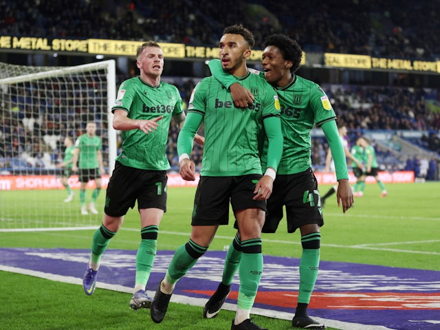 Stoke City's Jacob Brown celebrates with his teammates after scoring his first goal on 28 January 2022
