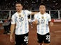 Argentina's Lautaro Martinez celebrates scoring their first goal with Giovani Lo Celso on February 1, 2022