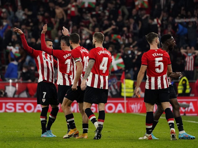 Athletic Bilbao's Alex Berenguer celebrates scoring their first goal with teammates on February 3, 2022