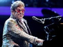 Elton John charms the crowd with his tongue on January 20, 2022