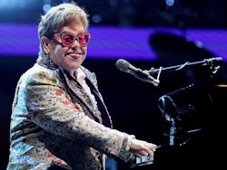 Elton John charms the crowd with his tongue on January 20, 2022