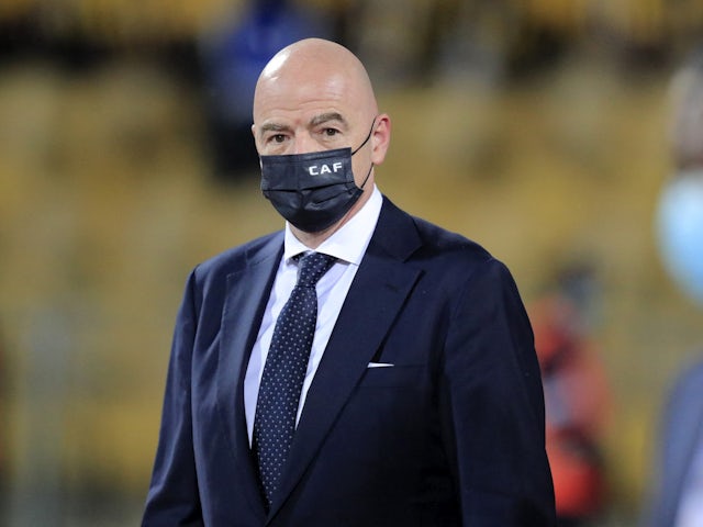 FIFA President Gianni Infantino is seen wearing a protective face mask after Cameroon won the third place playoff on February 5, 2022
