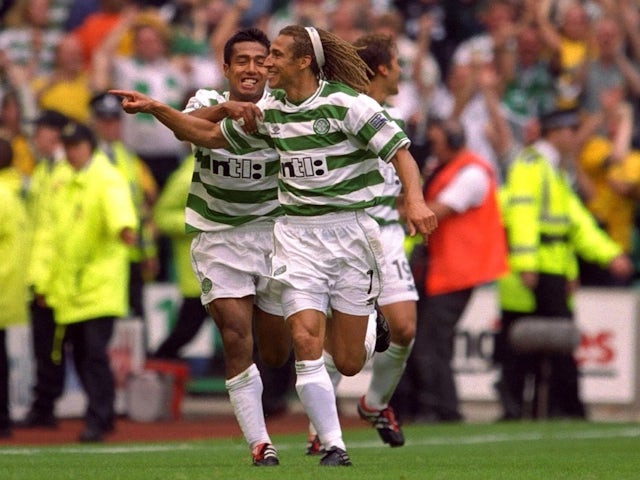 Celtic's Henrik Larsson celebrates scoring against Rangers on August 27, 2000