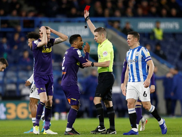 Derby County's Richard Stearman is shown a red card by referee Matthew Donohue on February 2, 2022
