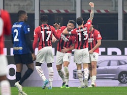 AC Milan's Olivier Giroud celebrates scoring their first goal with teammates on February 5, 2022