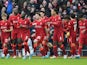 Liverpool's Diogo Jota celebrates scoring their first goal with Virgil van Dijk and teammates on February 6, 2022