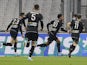 Angers' Angelo Fulgini celebrates scoring their first goal with Jimmy Cabot, Nabil Bentaleb and Thomas Mangani on February 4, 2022