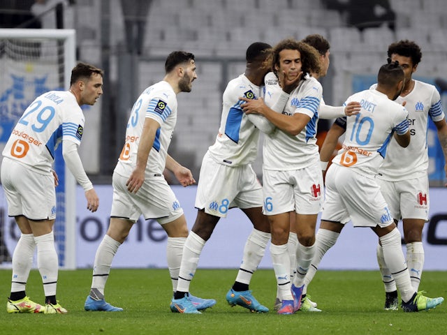 Marseille's Gerson celebrates scoring their second goal with teammates  on February 4, 2022