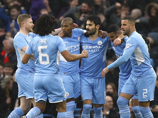 Manchester City's Ilkay Gundogan celebrates scoring their first goal with teammates on February 5, 2022