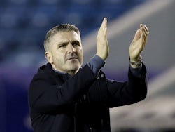 Preston North End manager Ryan Lowe applauds fans after the match on February 1, 2022