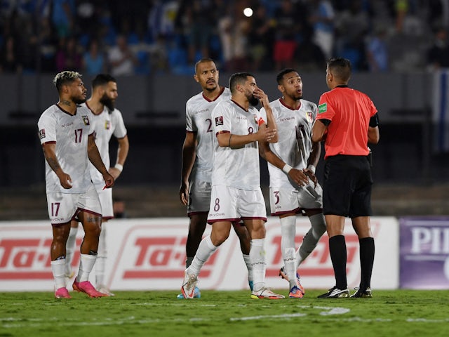 1 February 2022, Venezuela's Jordan Osorio and teammates protest with the referee