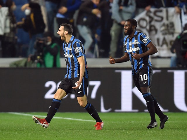 Atalanta's Davide Zappacosta celebrates scoring their first goal with Jeremie Boga on February 10, 2022