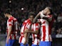 Atletico Madrid's Angel Correa celebrates scoring their first goal with teammates on February 12, 2022