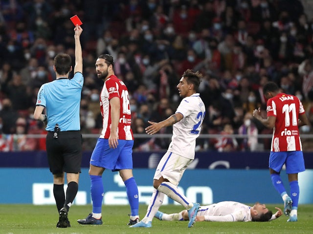 Atletico Madrid's Felipe is shown a red card by referee Ricardo de Burgos Bengoetxea on February 12, 2022