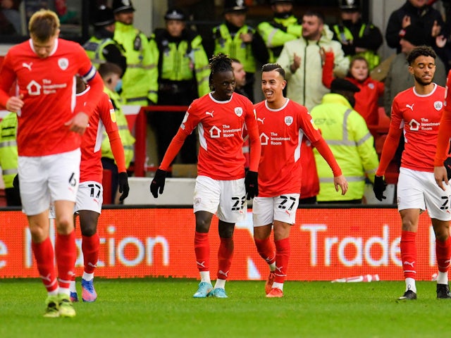 Barnsley's Domingos Quina celebrates scoring their first goal with teammates on February 12, 2022