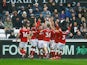 Bristol City's Andreas Weimann celebrates scoring their first goal with teammates on February 13, 2022