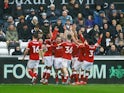 Bristol City's Andreas Weimann celebrates scoring their first goal with teammates on February 13, 2022