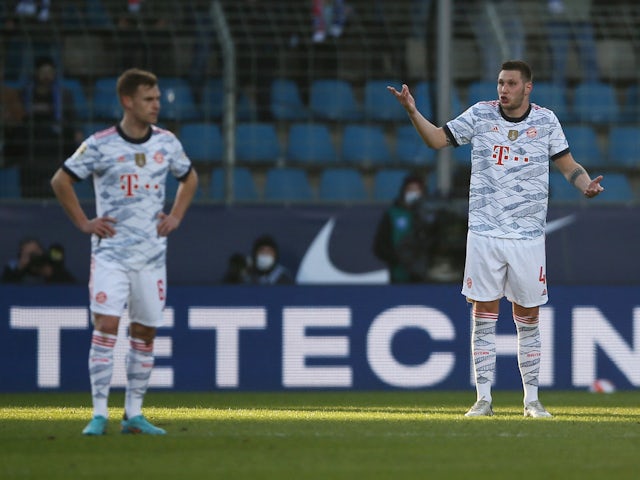 Bayern Munich's Niklas Sule reacts after VfL Bochum's Cristian Gamboa scores their third goal on February 12, 2022
