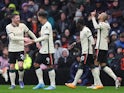 Liverpool's Fabinho celebrates scoring their first goal with Sadio Mane, Roberto Firmino and Andrew Robertson on February 13, 2022