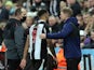Newcastle United's Callum Wilson with manager Eddie Howe as he is substituted after sustaining an injury on December 27, 2021