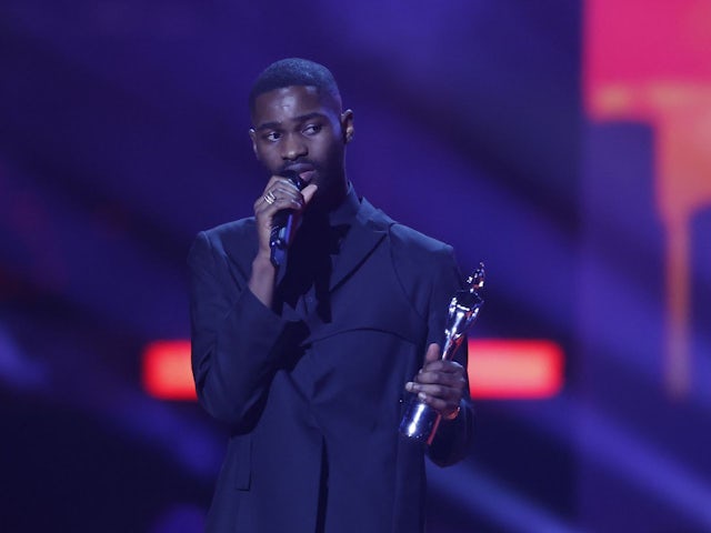 Dave receives the Best Rap award at the Brits on February 8, 2022