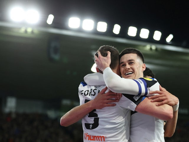 Derby County's Craig Forsyth celebrates after scoring their first goal  on February 8, 2022