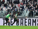 Sassuolo's Hamed Traore celebrates scoring their first goal with Domenico Berardi on February 10, 2022