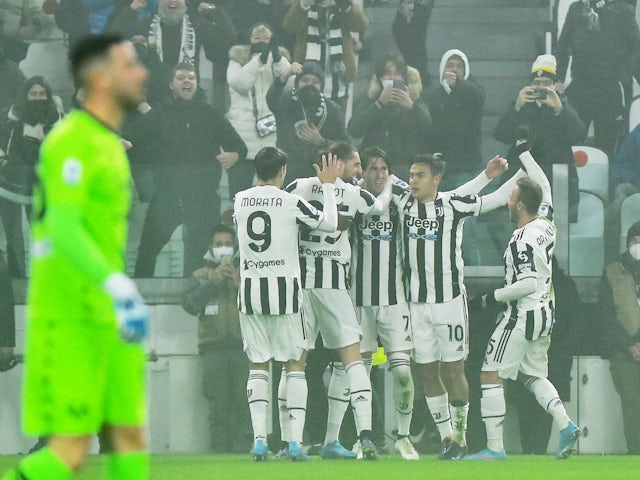 Juventus' Dusan Vlahovic celebrates scoring their first goal with teammates on February 6, 2022