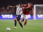 Monterrey's Maximiliano Meza in action with Al Ahly's Ahmed Abdel at the Club World Cup on February 5, 2022