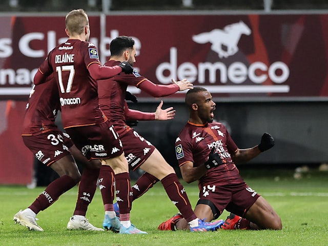 Metz's Habib Maiga celebrates scoring their first goal with teammates on February 13, 2022