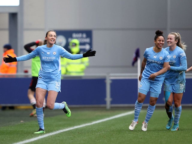 Manchester City's Caroline Weir celebrates scoring their first goal with teammates on February 13, 2022