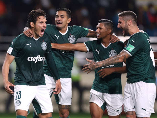 Palmeiras' Raphael Veiga celebrates scoring their first goal with teammates on February 8, 2022