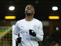 Manchester City's Raheem Sterling celebrates scoring their fourth goal to complete his hat-trick on February 12, 2022