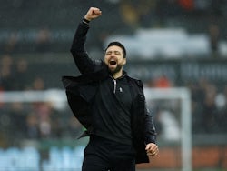 Swansea City's manager Russell Martin celebrates after the match on February 13, 2022