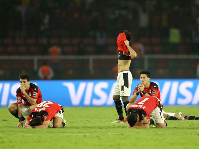Egypt players looks dejected after losing the penalty shoot out on February 6, 2022