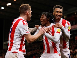 Stoke City's Jaden Philogene-Bidace celebrates scoring their first goal with teammates on February 8, 2022