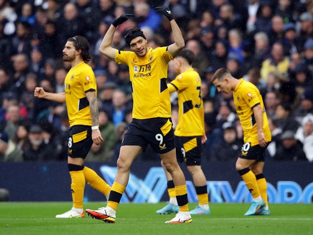 Raul Jimenez of Wolverhampton Wanderers celebrates his first goal with Ruben Neves on February 13, 2022