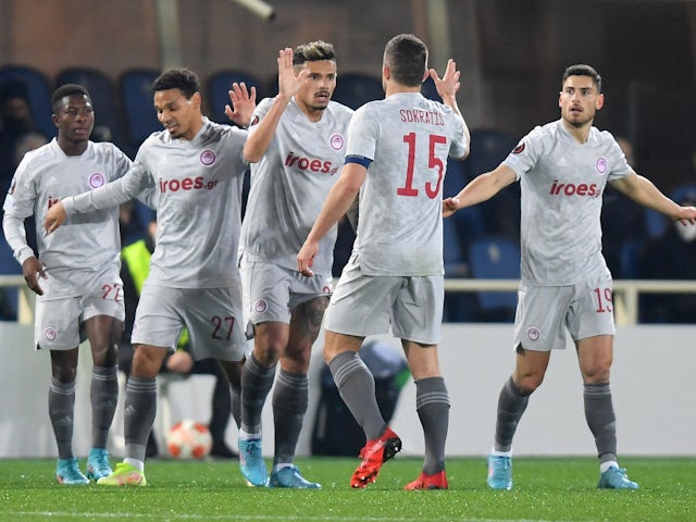 Tiquinho Soares of Olympiacos celebrates with his teammates as he scores his first goal on 17 February 2022